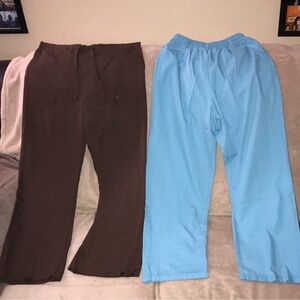 Bundle of two XS scrub pants blue and brown damaged